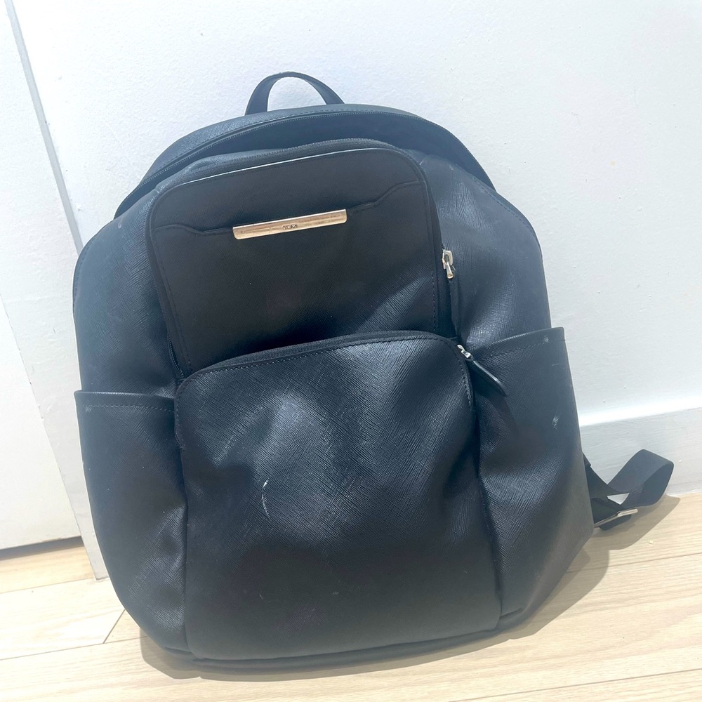 Tumi backpack in black leather